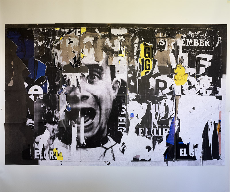 large scale collage of peeling poster wall